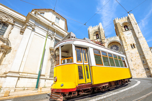 Tram outside Lisbon cathedral, Portugal