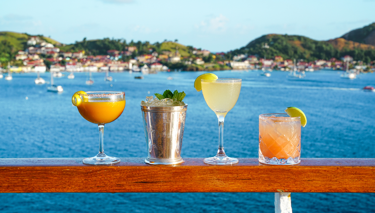 Enjoying cocktails on a Seabourn cruise in the Caribbean, a destination that features in our 2022 cruise trends