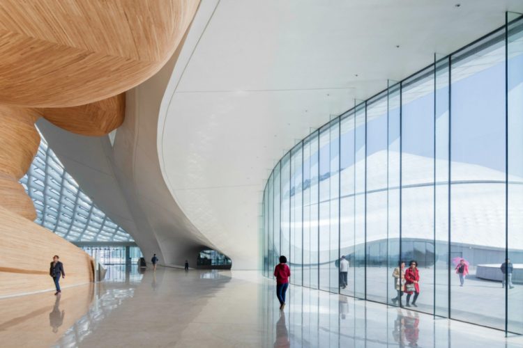 Explore the Sinuous Harbin Opera House Architecture by Studio MAD - Best Architecture Projects - Harbin Opera House architectural project ➤ Discover the season's newest design news and inspiration ideas. Visit Daily Design News and subscribe our newsletter! #dailydesignnews #StudioMAD #HarbinOperaHouse #ArchitectureProjects